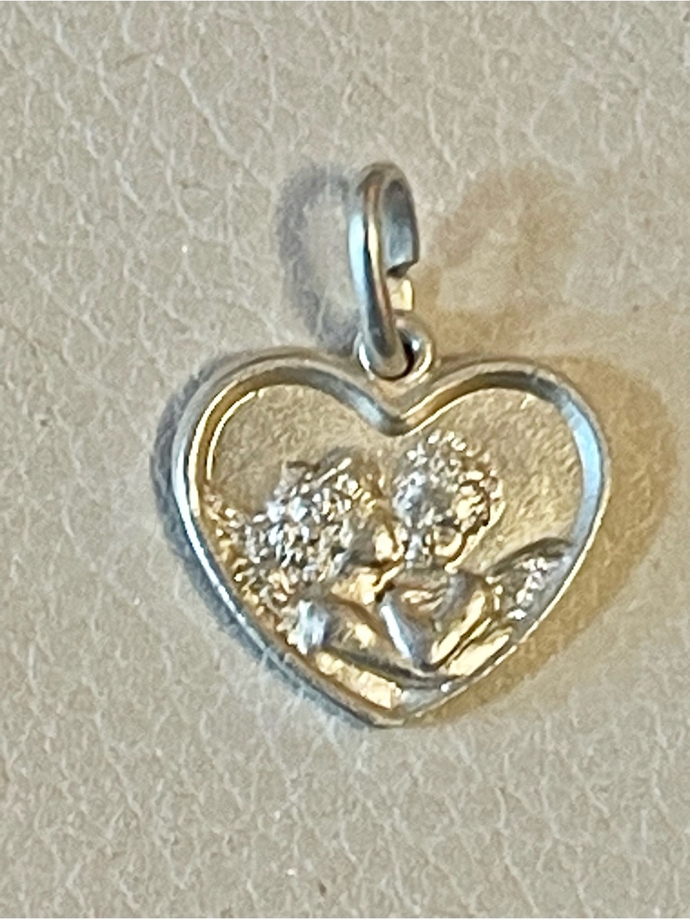 Sterling Silver kissing angel heart pendant